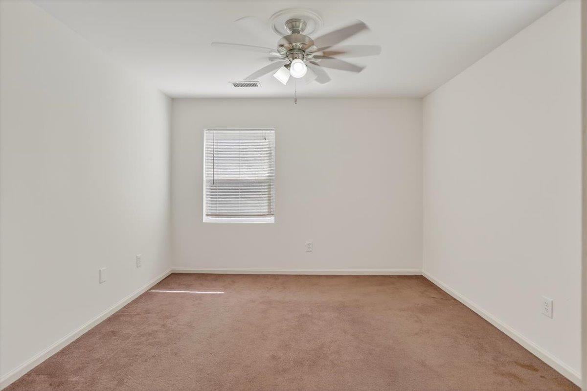 4850 Marcel Avenue Memphis, TN 38122 - Photo 19 of 20 bedroom with carpet and a ceiling fan