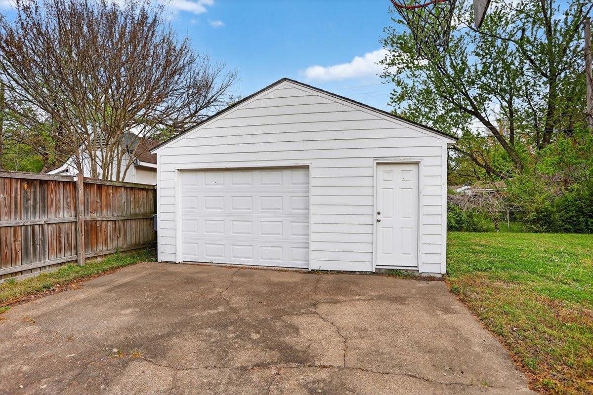 4850 Marcel Avenue Memphis, TN 38122 - Photo 4 of 20 Detached garage featuring concrete driveway