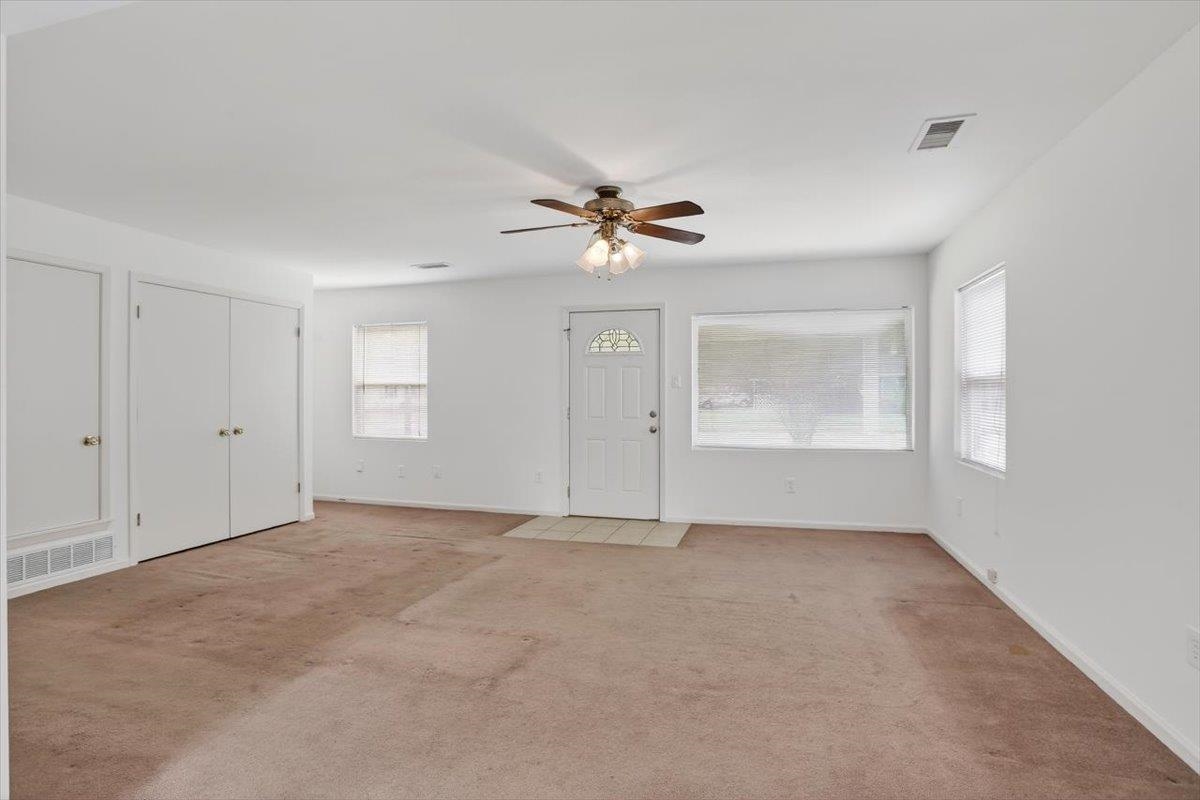 4850 Marcel Avenue Memphis, TN 38122 - Photo 6 of 20 Carpeted entrance foyer with ceiling fan and baseboards
