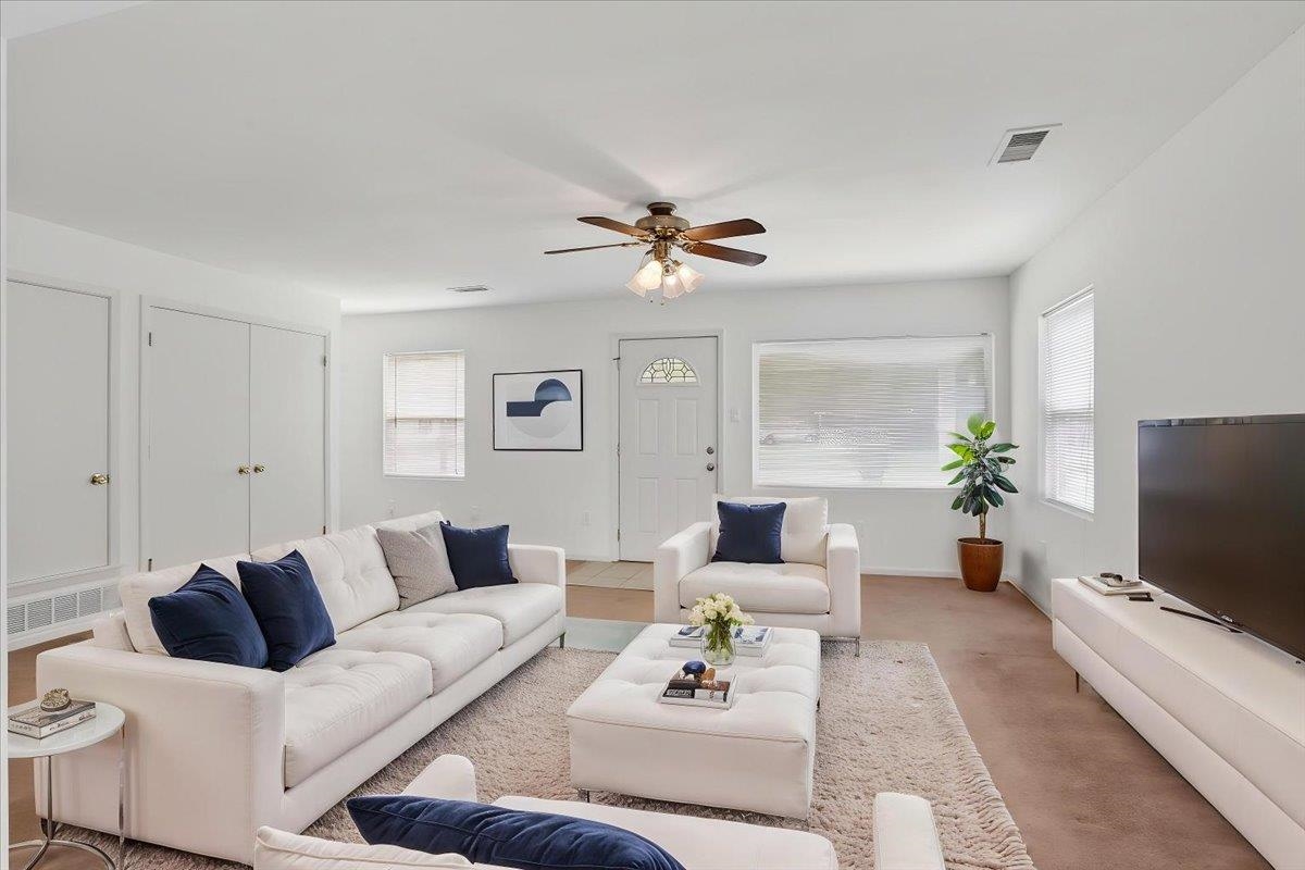 4850 Marcel Avenue Memphis, TN 38122 - Photo 9 of 20 Living room with carpet and ceiling fan