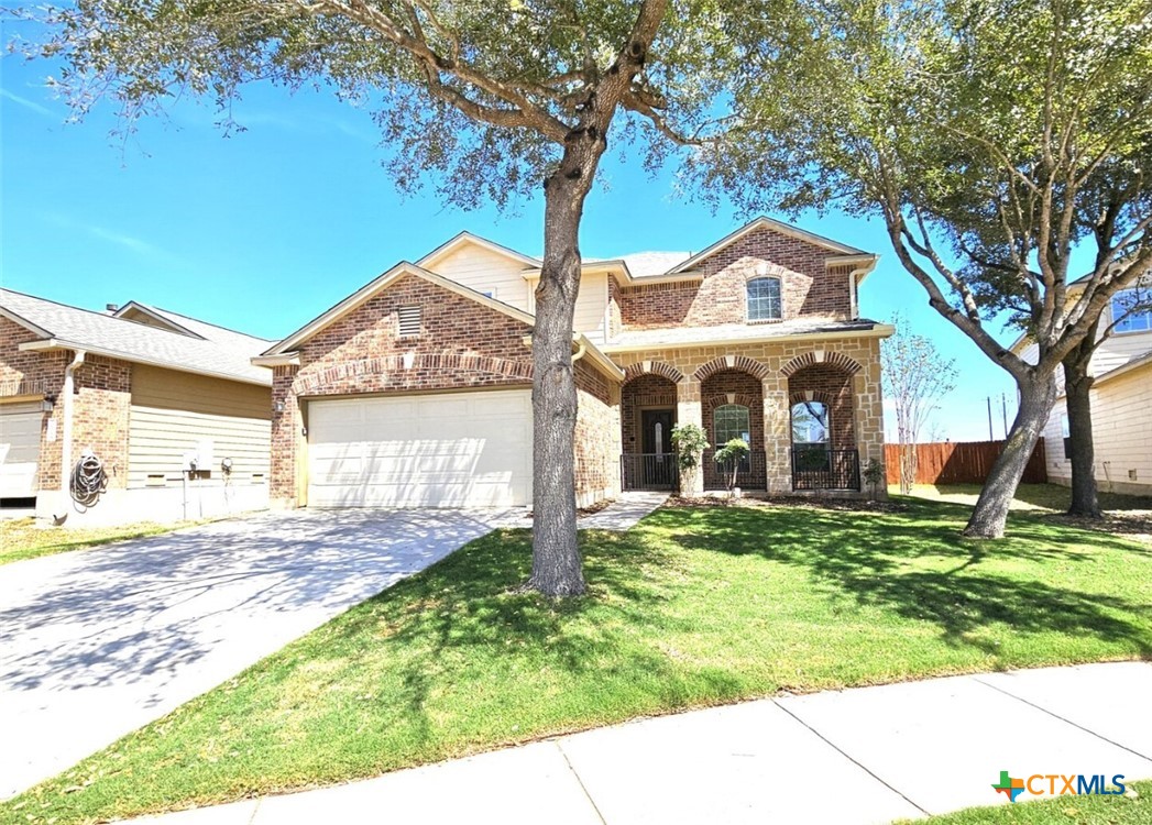 316 Julian Point Cibolo, TX 78108 - Photo 1 of 28 a front view of a house with garden