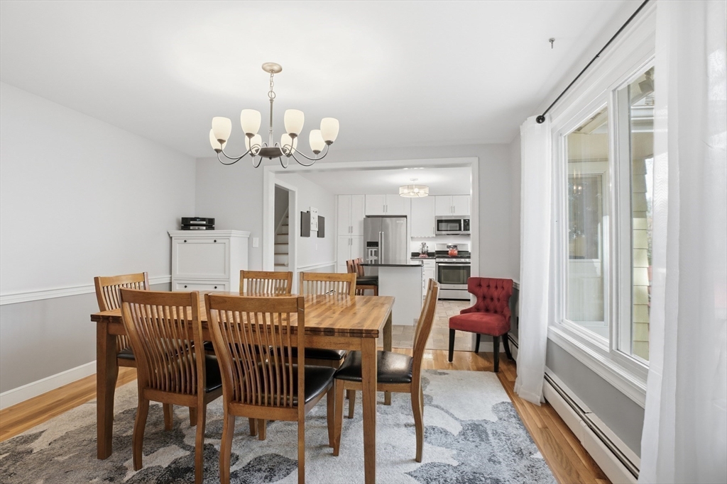 5 Carnegie Place Lexington, MA 02420 - Photo 12 of 39 a view of a dining room with furniture window and outside view