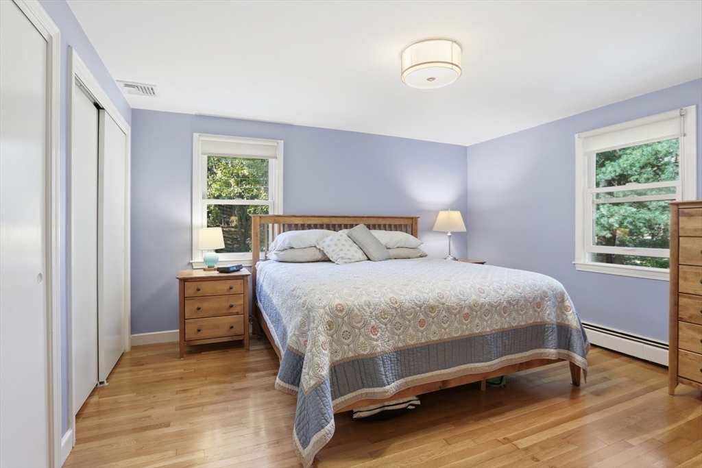 5 Carnegie Place Lexington, MA 02420 - Photo 15 of 39 a bedroom with a bed and a window