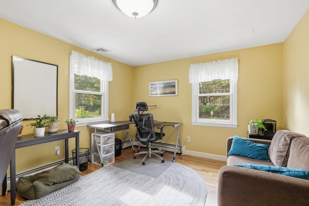 5 Carnegie Place Lexington, MA 02420 - Photo 19 of 39 a living room with furniture and a window