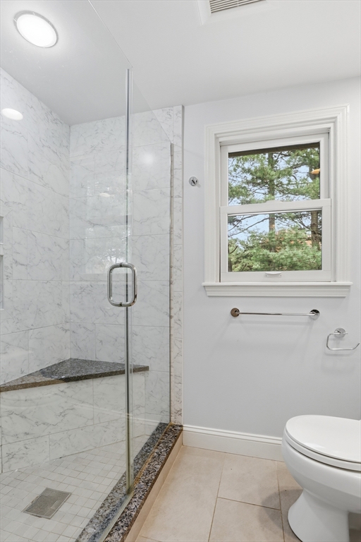 5 Carnegie Place Lexington, MA 02420 - Photo 25 of 39 a bathroom with a toilet and a shower