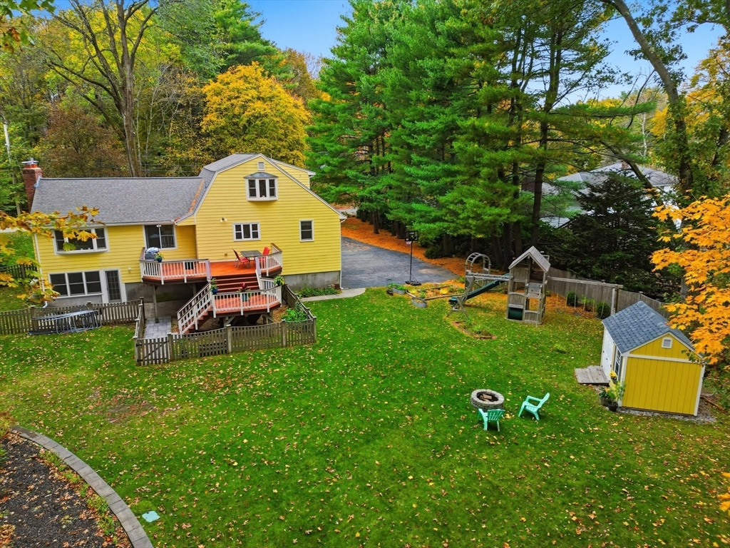 5 Carnegie Place Lexington, MA 02420 - Photo 3 of 39 an aerial view of a house with backyard garden and outdoor seating