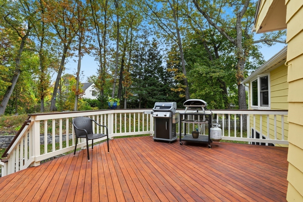 5 Carnegie Place Lexington, MA 02420 - Photo 34 of 39 a view of a wooden deck with a large trees