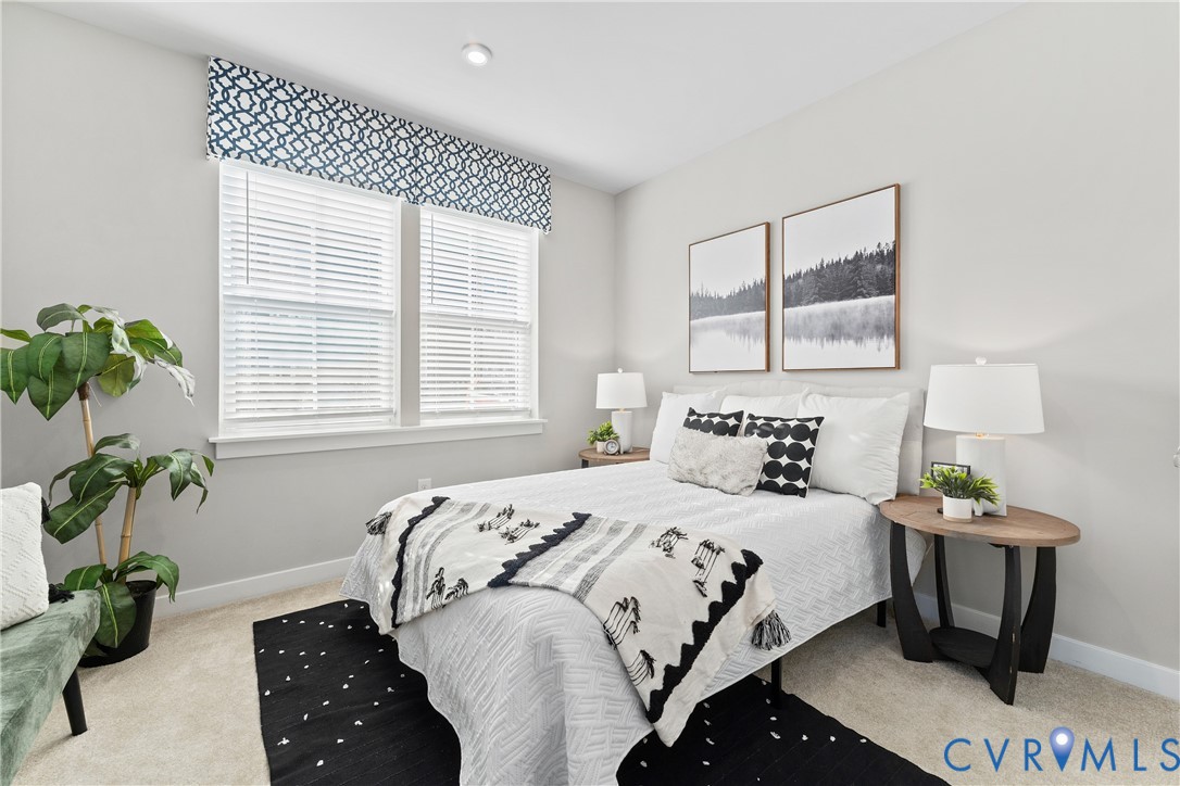 6601 Citory Way, Unit 106 Moseley, VA 23120 - Photo 20 of 39 a bedroom with a bed and a window