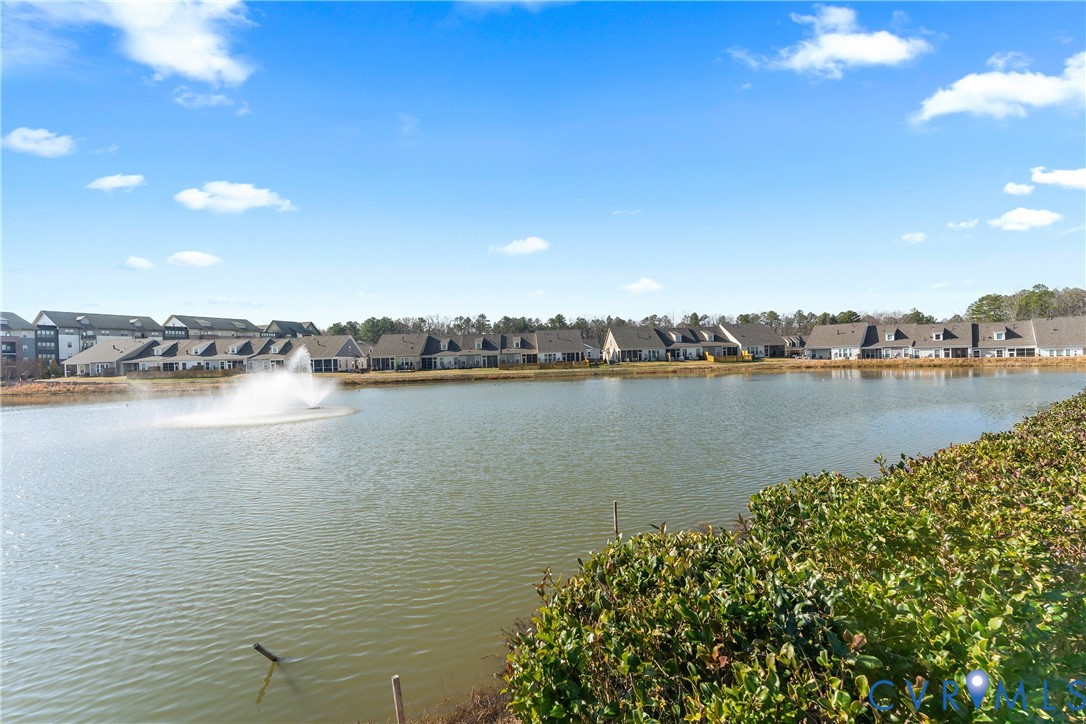 6601 Citory Way, Unit 106 Moseley, VA 23120 - Photo 35 of 39 a view of a lake with houses