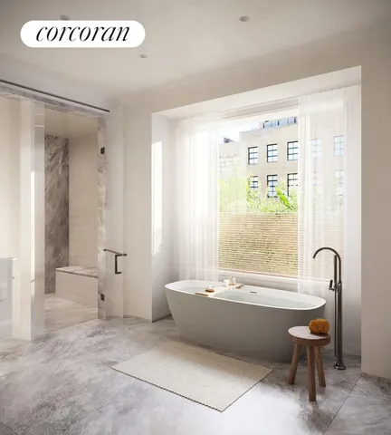 a bathroom with a bathtub and mirror