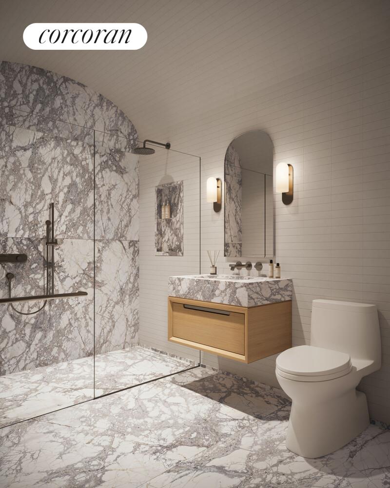 140 Jane Street, Unit 2S Manhattan, NY 10014 - Photo 6 of 13 a bathroom with a toilet sink and mirror