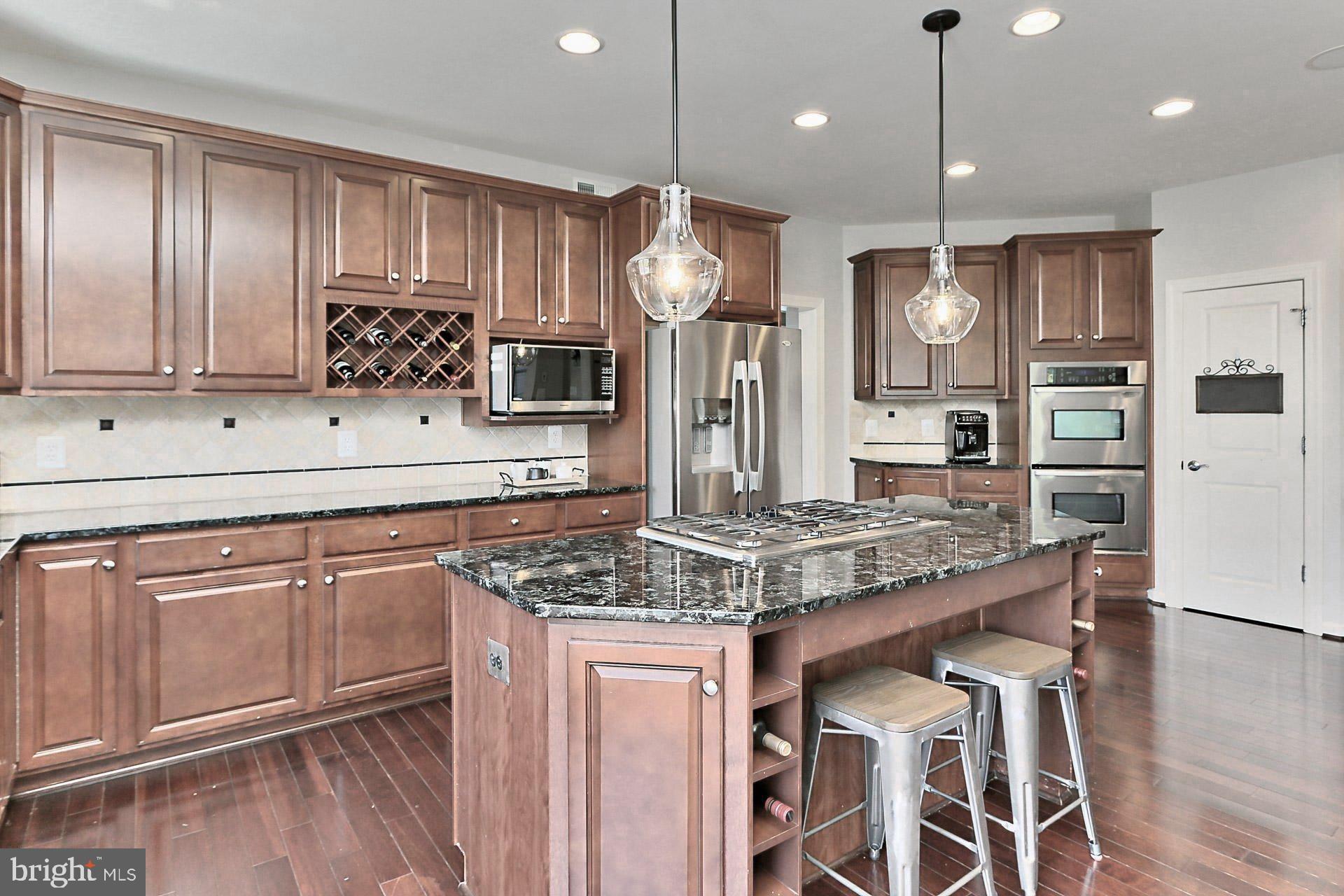 42395 Rising Moon Place Brambleton, VA 20148 - Photo 12 of 82 Tons of Cabinetry w/ Beverage Racks + Clg Speakers