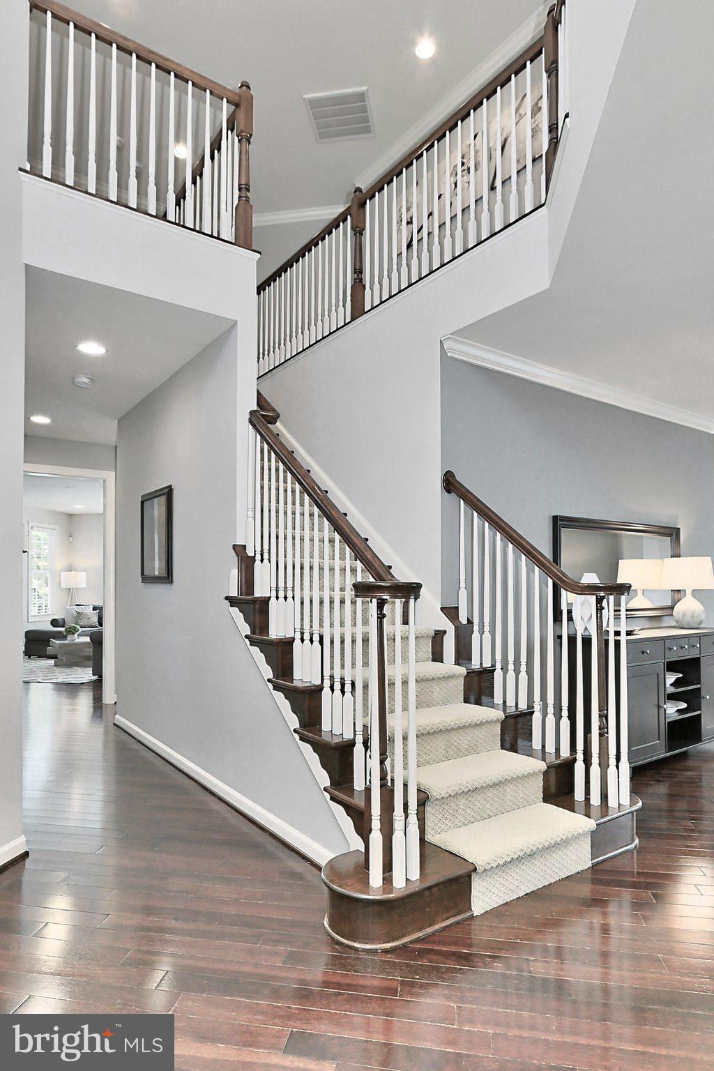 42395 Rising Moon Place Brambleton, VA 20148 - Photo 16 of 82 Heading upstairs- Wood Stair with Runner
