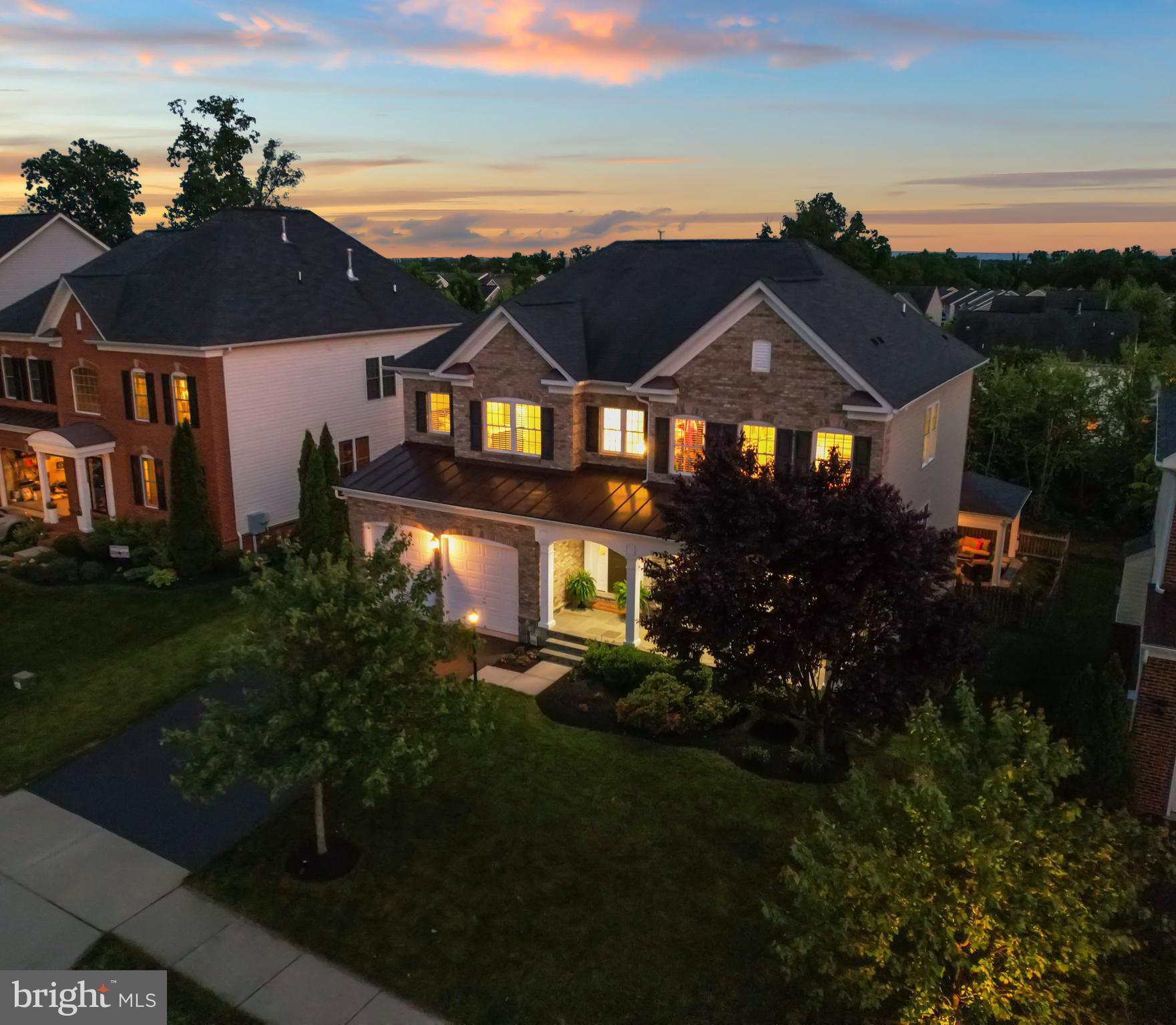 42395 Rising Moon Place Brambleton, VA 20148 - Photo 51 of 82 UPSCALE EXTERIOR W/ BRICK AND STONE ACCENTS