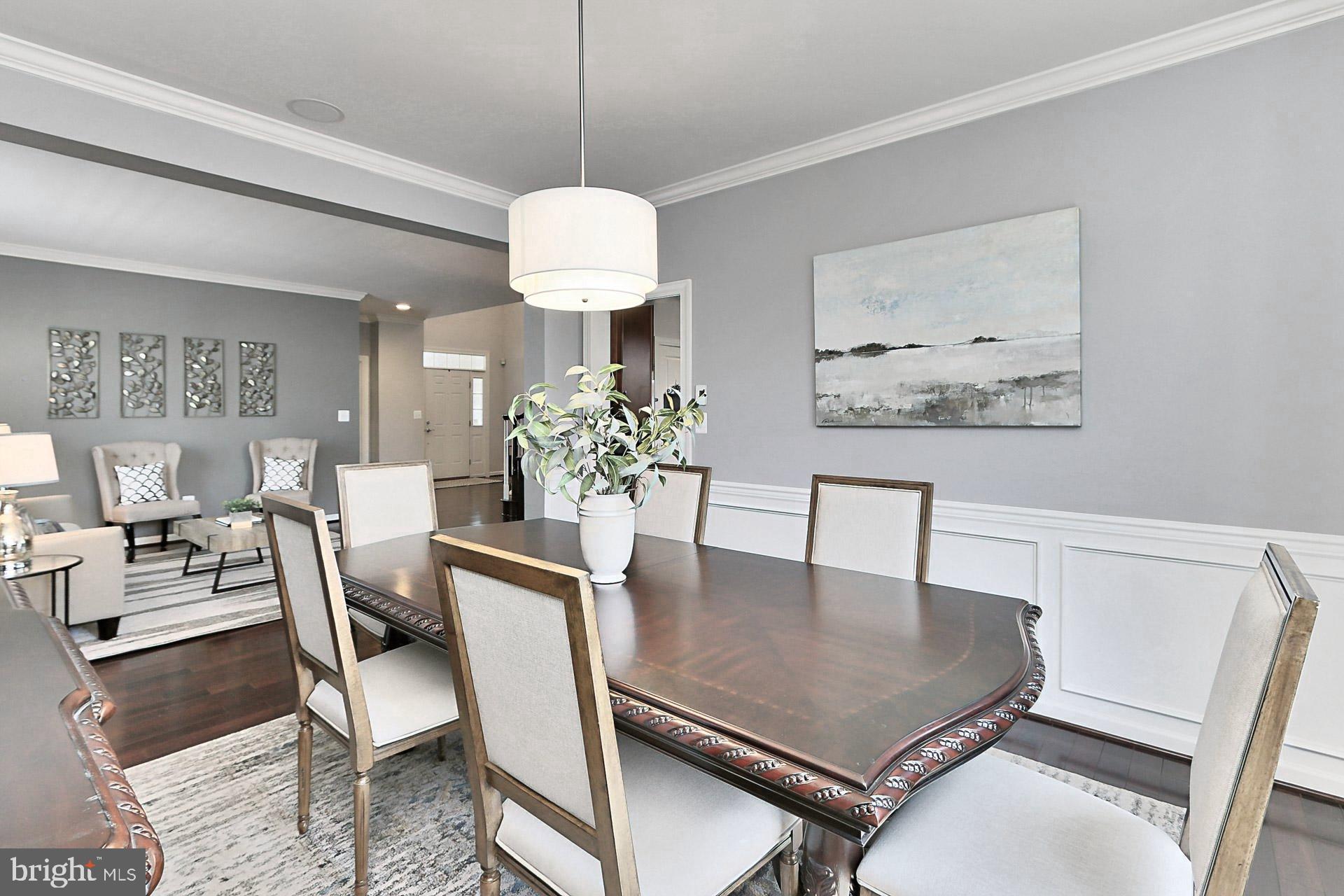 42395 Rising Moon Place Brambleton, VA 20148 - Photo 8 of 82 Dining Room Can easily seat 12-14 people
