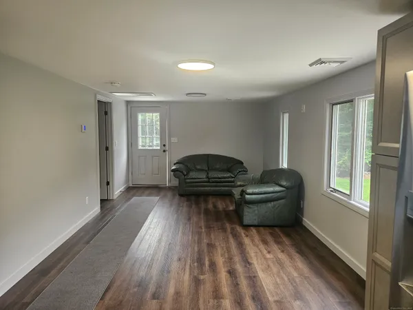 a living room with a couch and a table