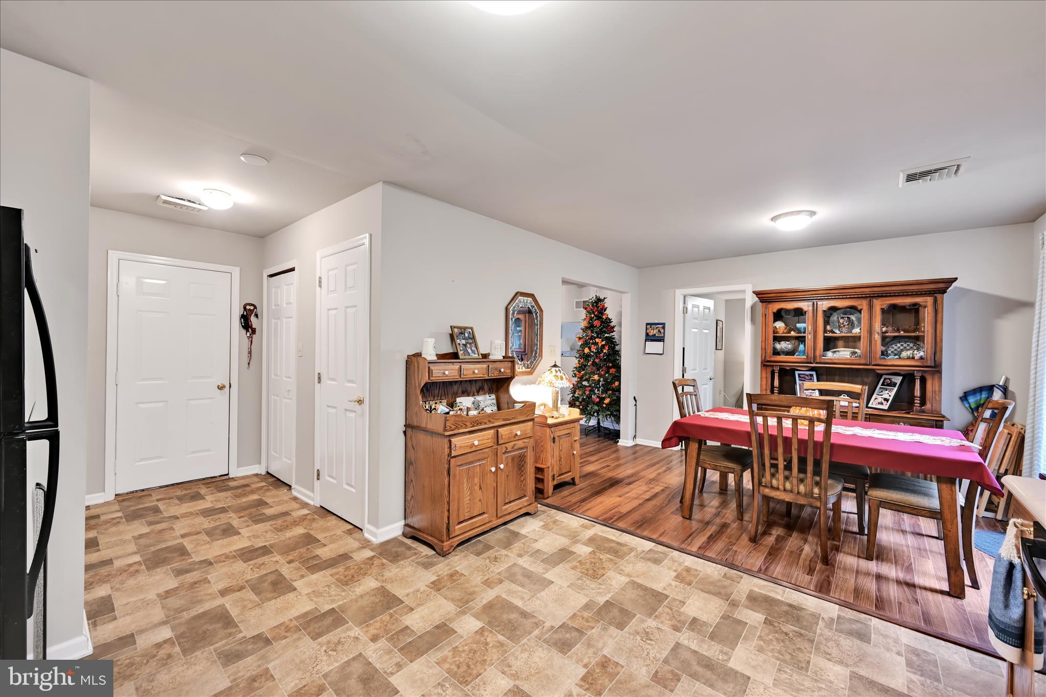 32 Knollwood Road Millersville, PA 17551 - Photo 11 of 28 a living room with furniture a window and a flat screen tv