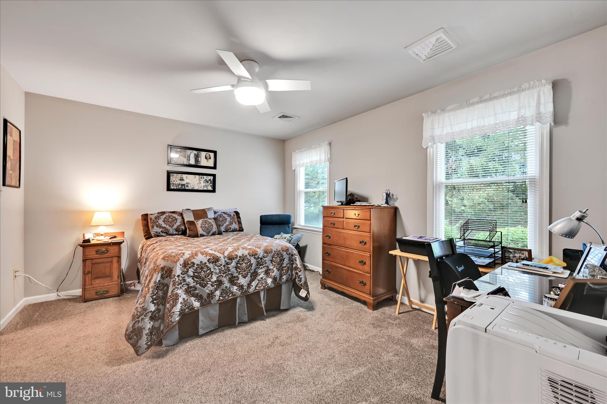 32 Knollwood Road Millersville, PA 17551 - Photo 14 of 28 a bedroom with bed and large windows