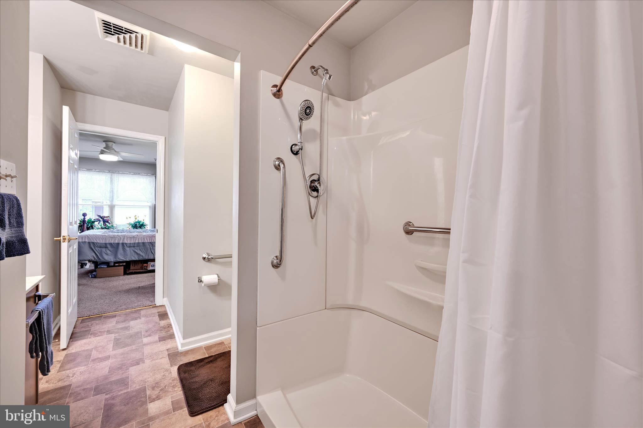 32 Knollwood Road Millersville, PA 17551 - Photo 17 of 28 a bathroom with a shower and a bath tub