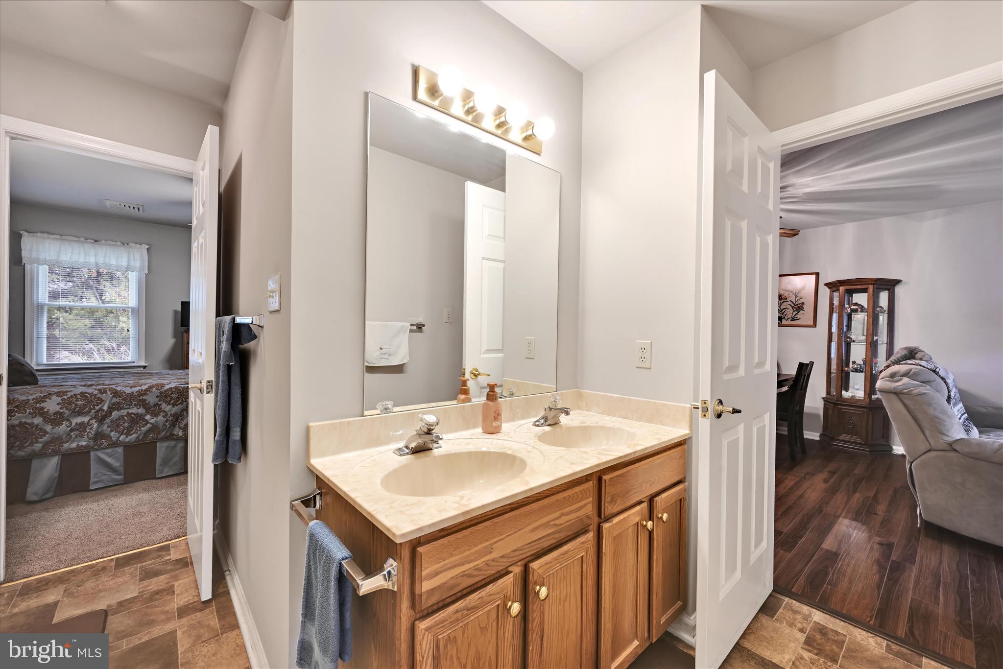 32 Knollwood Road Millersville, PA 17551 - Photo 18 of 28 a bathroom with a sink and a mirror