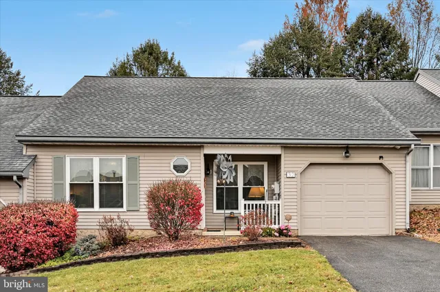 a front view of house with outdoor space