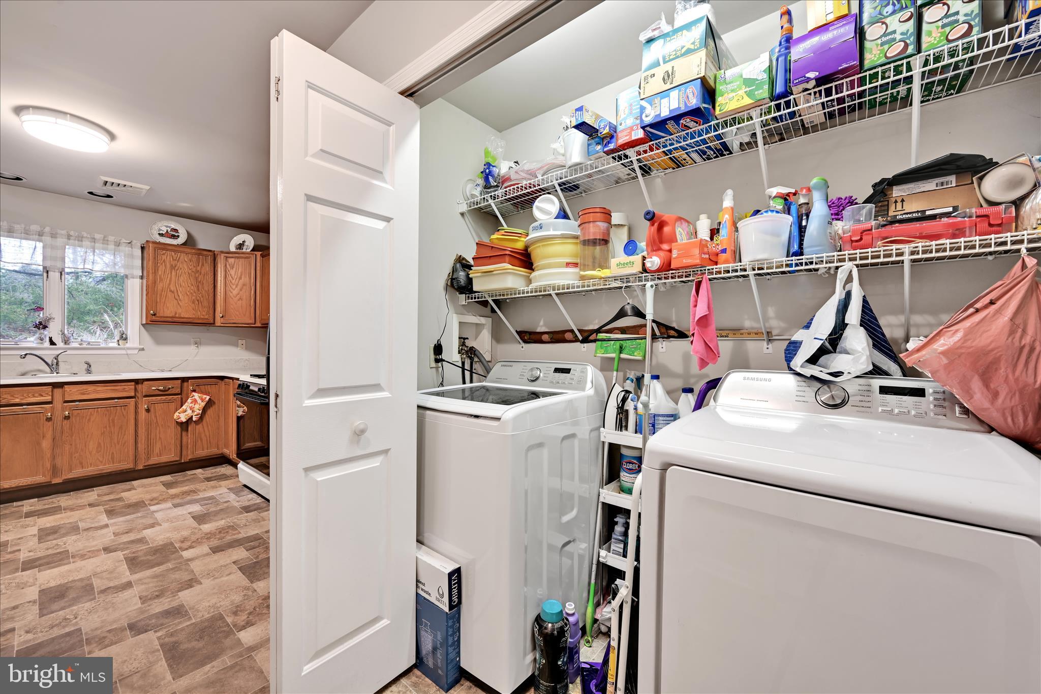 32 Knollwood Road Millersville, PA 17551 - Photo 23 of 28 a storage room with washer and dryer