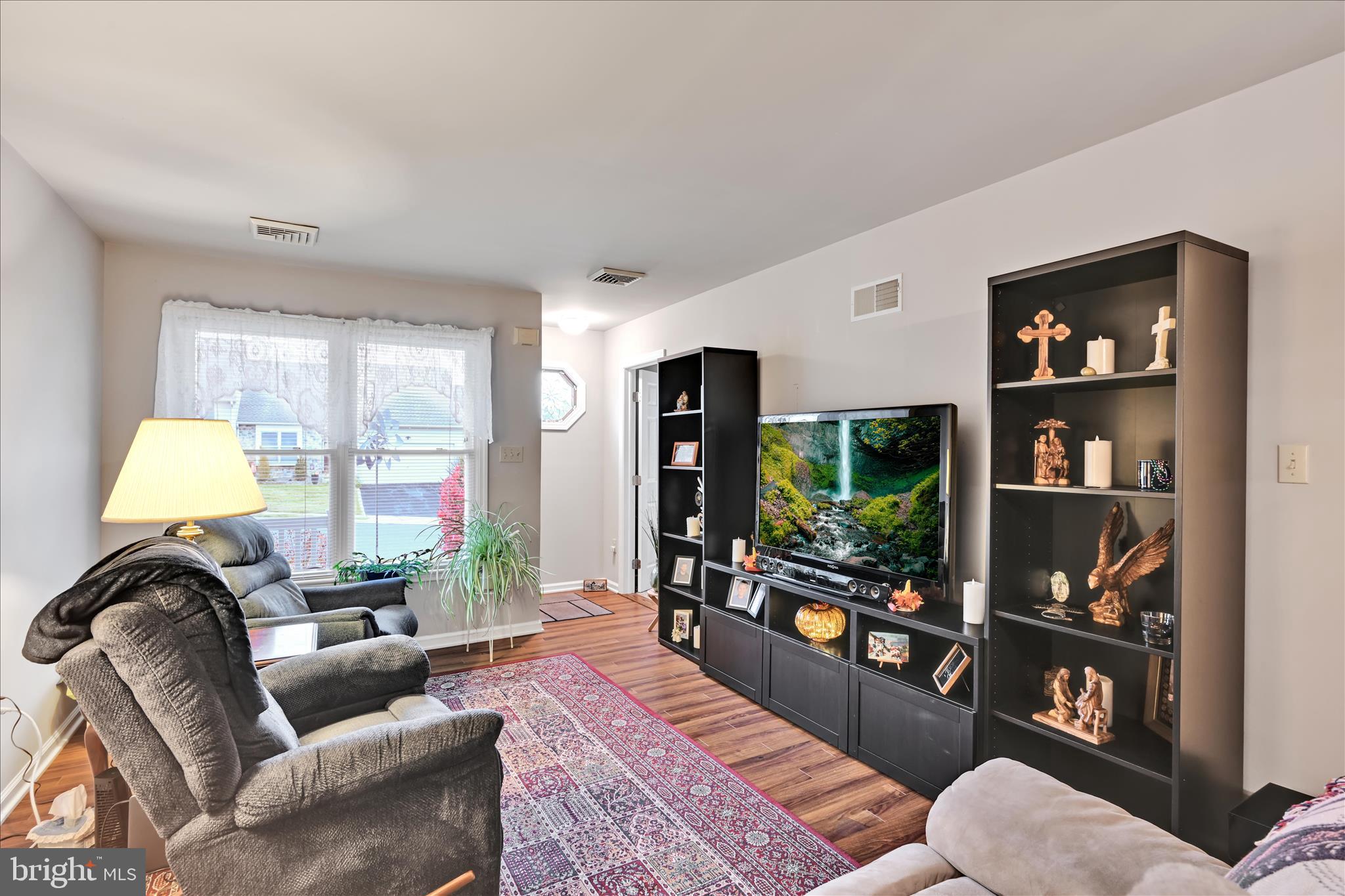 32 Knollwood Road Millersville, PA 17551 - Photo 7 of 28 a living room with furniture and a lamp