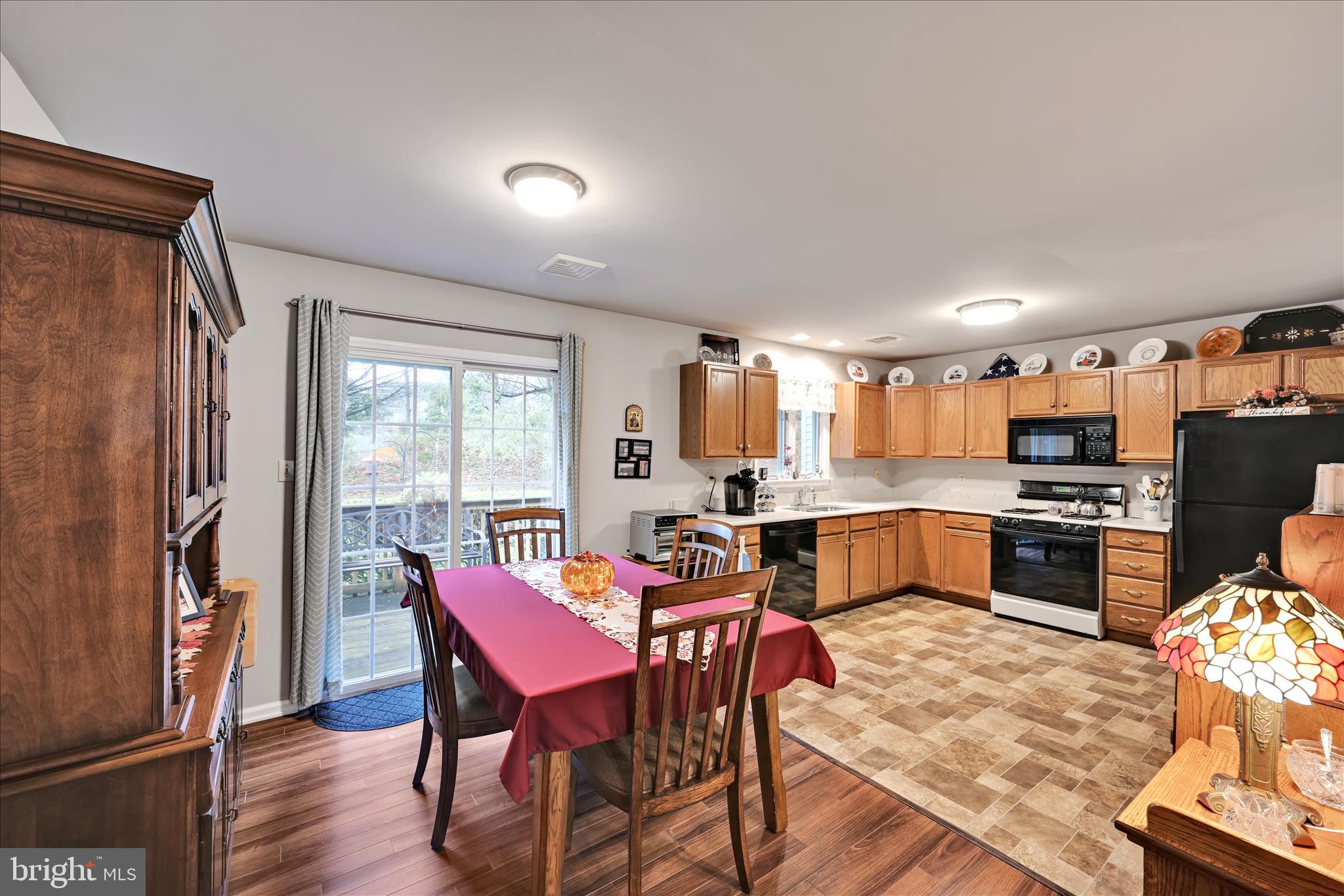 32 Knollwood Road Millersville, PA 17551 - Photo 9 of 28 a view of a dining room with furniture window and wooden floor
