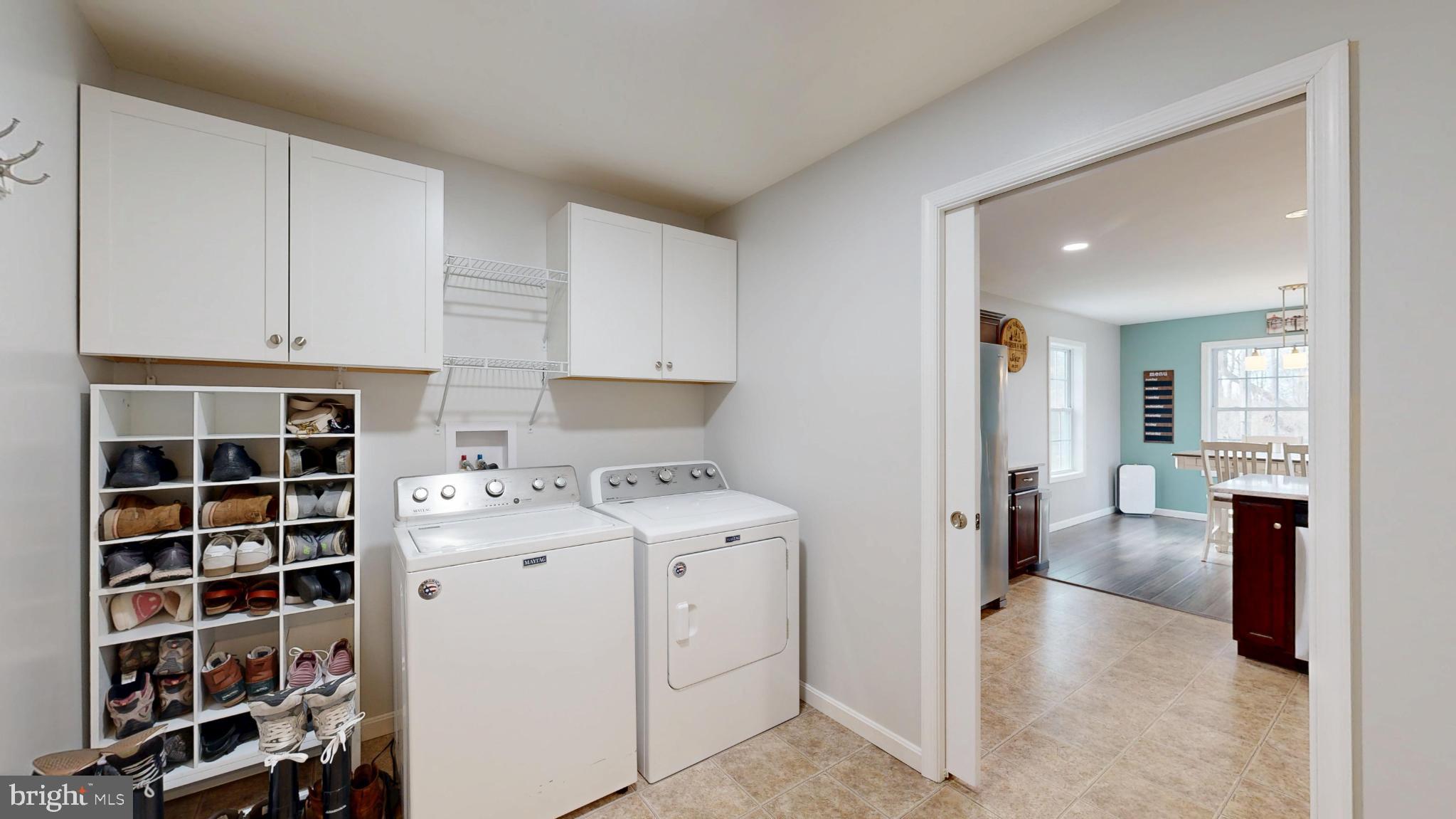 202 East Buck Point Road Clayton, DE 19938 - Photo 15 of 53 a view of living room with furniture and cabinets