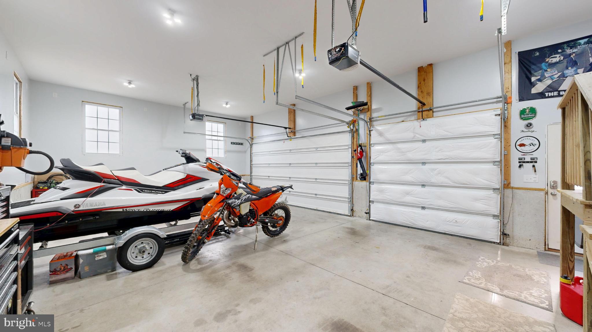 202 East Buck Point Road Clayton, DE 19938 - Photo 17 of 53 a view of a car garage with furniture