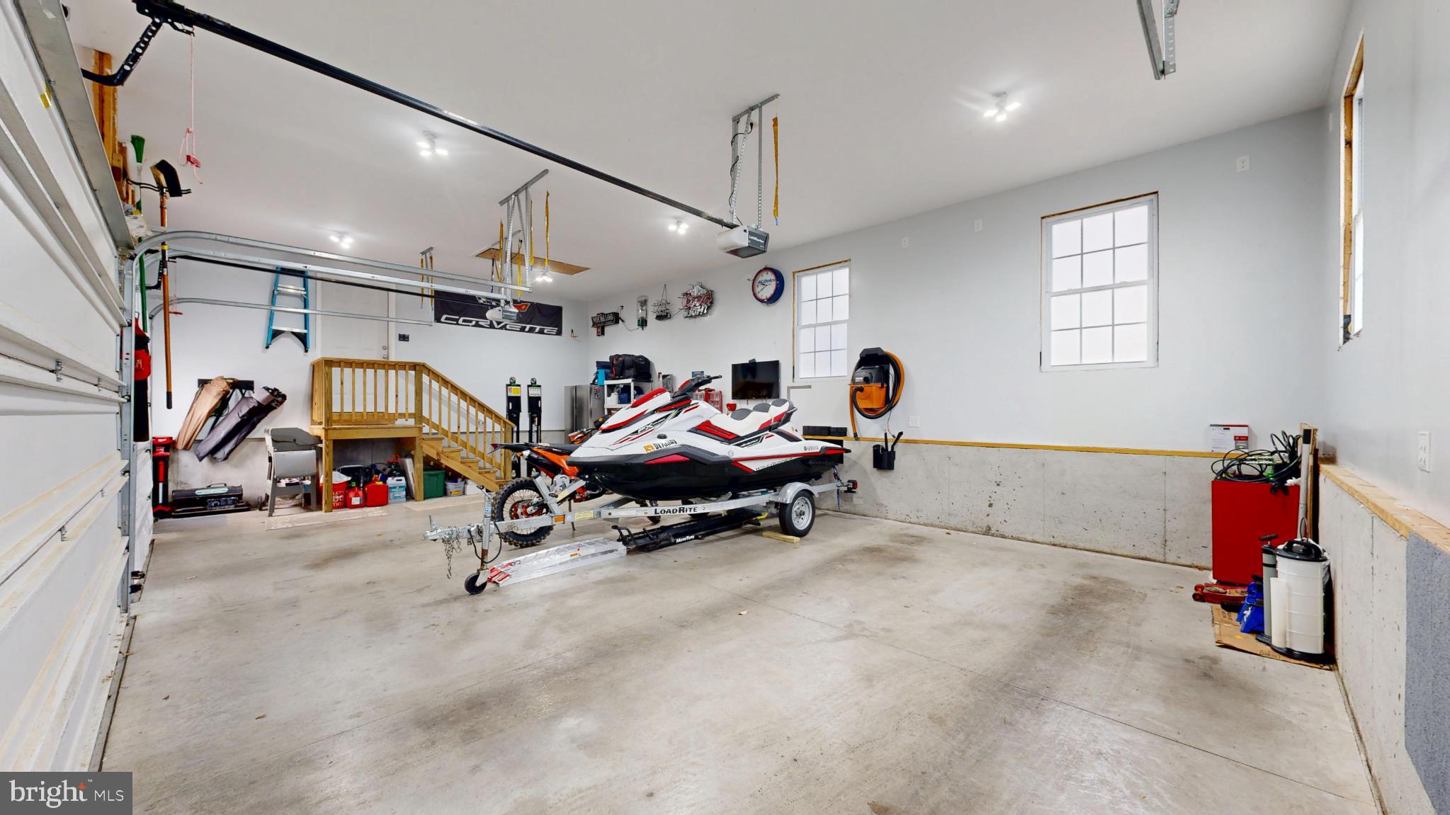 202 East Buck Point Road Clayton, DE 19938 - Photo 19 of 53 a garage with table and gym equipment