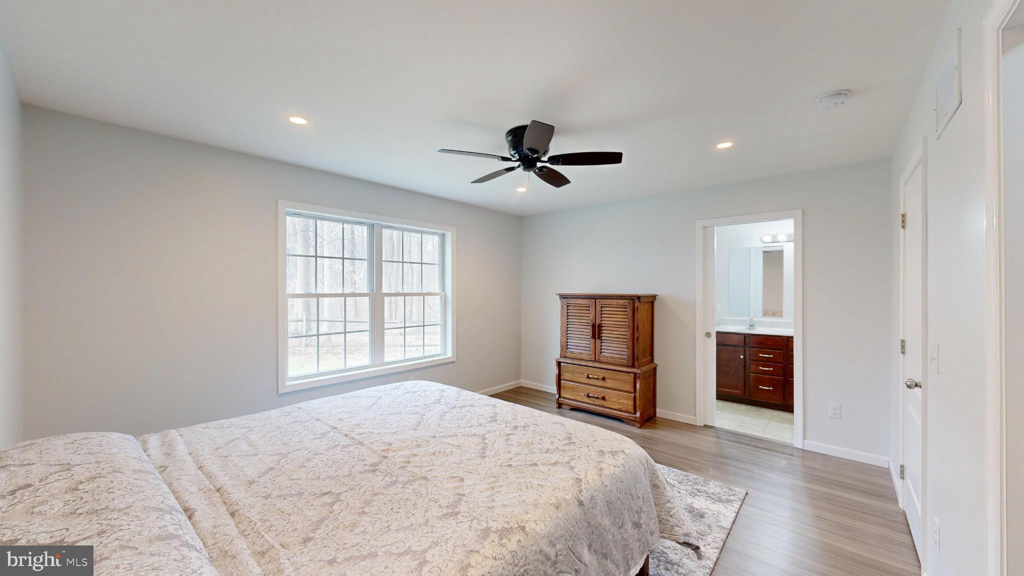 202 East Buck Point Road Clayton, DE 19938 - Photo 29 of 53 a bedroom with furniture and a window