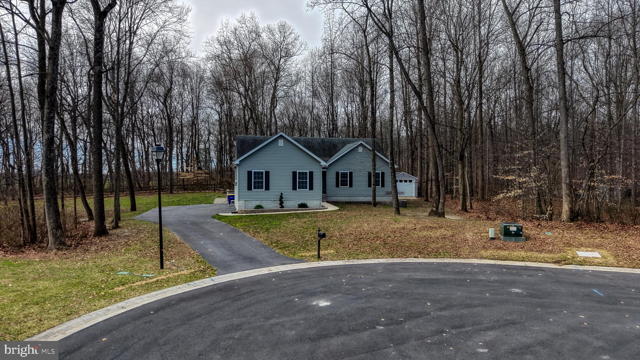 202 East Buck Point Road Clayton, DE 19938 - Photo 39 of 53 a view of a house with backyard and trees