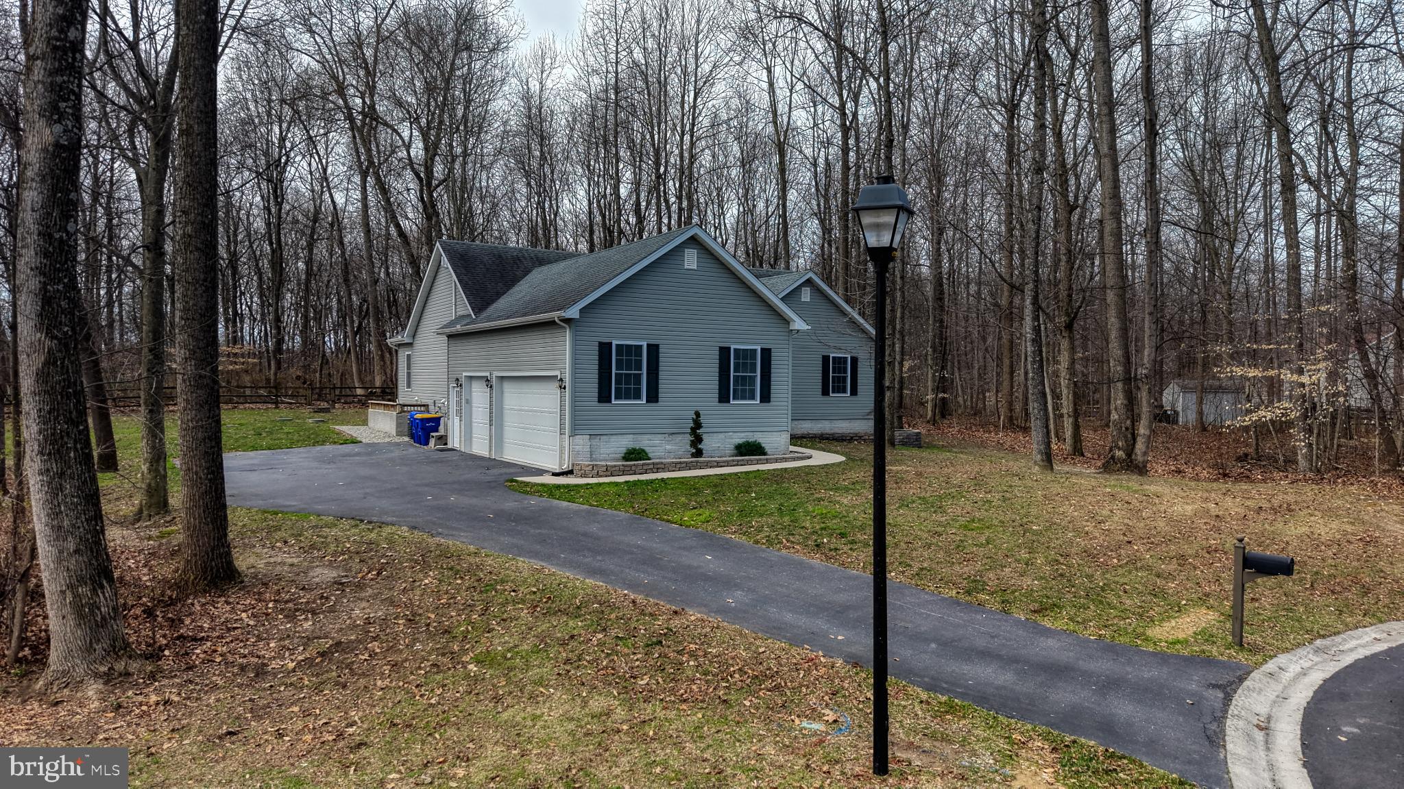 202 East Buck Point Road Clayton, DE 19938 - Photo 40 of 53 a front view of a house with garden