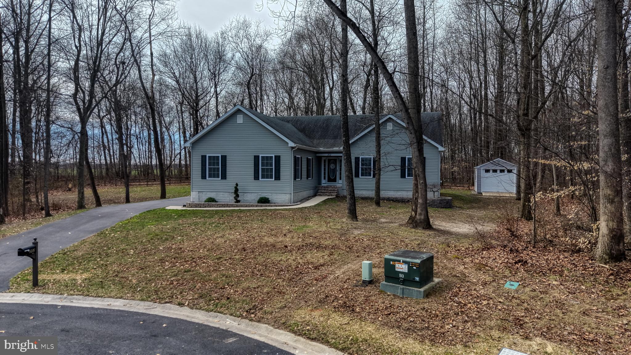 202 East Buck Point Road Clayton, DE 19938 - Photo 41 of 53 a front view of a house with a yard