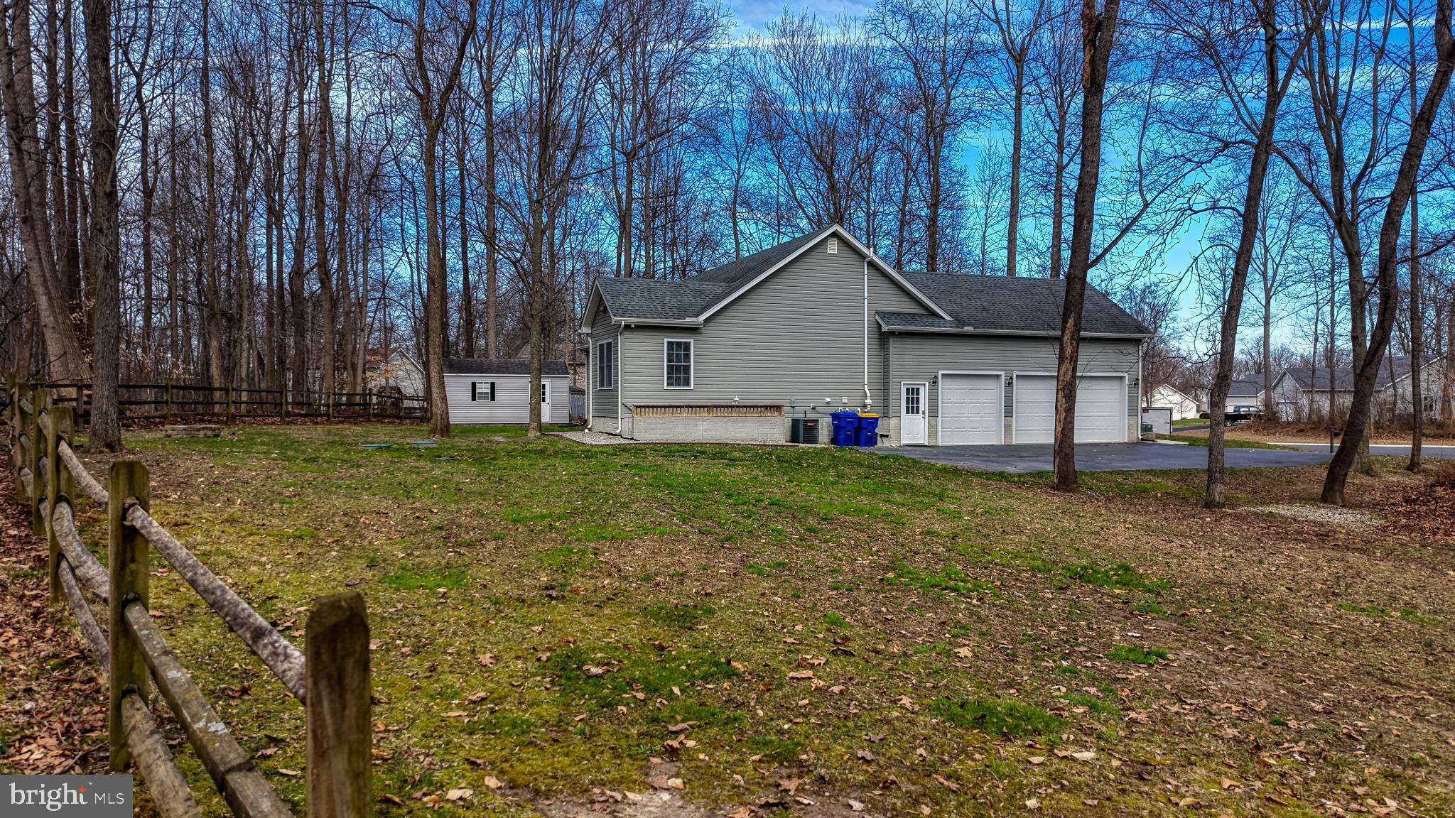 202 East Buck Point Road Clayton, DE 19938 - Photo 43 of 53 a view of a house with backyard and tree