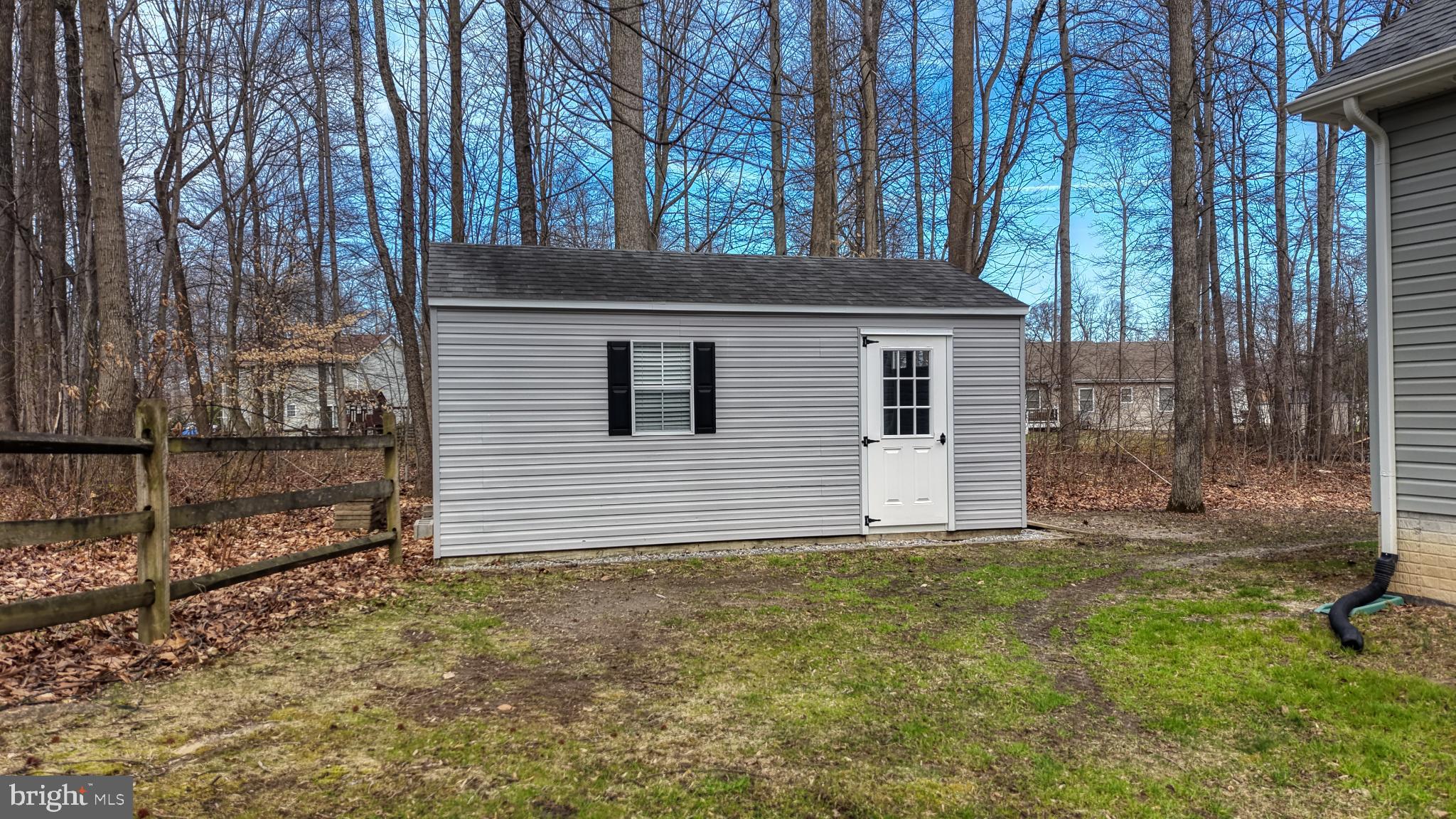 202 East Buck Point Road Clayton, DE 19938 - Photo 46 of 53 a view of a house with a yard