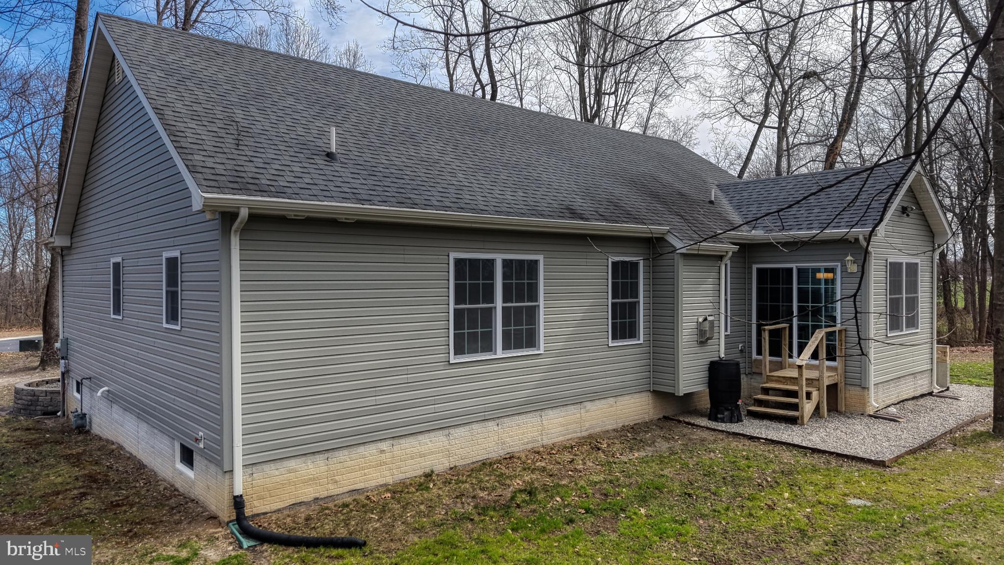 202 East Buck Point Road Clayton, DE 19938 - Photo 47 of 53 a front view of a house with garden