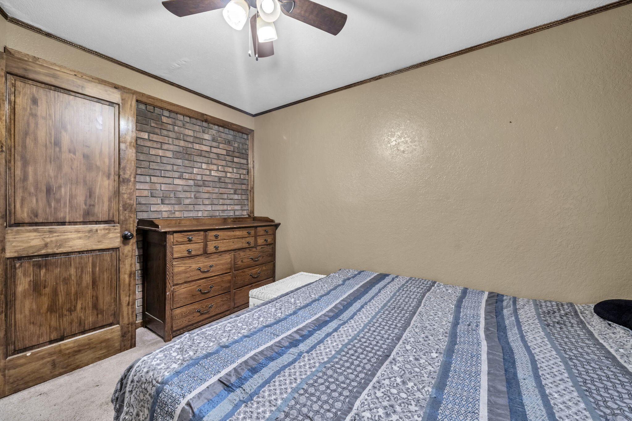6359 Childrens Lane Crestview, FL 32539 - Photo 20 of 50 a bedroom with a bed and a dresser