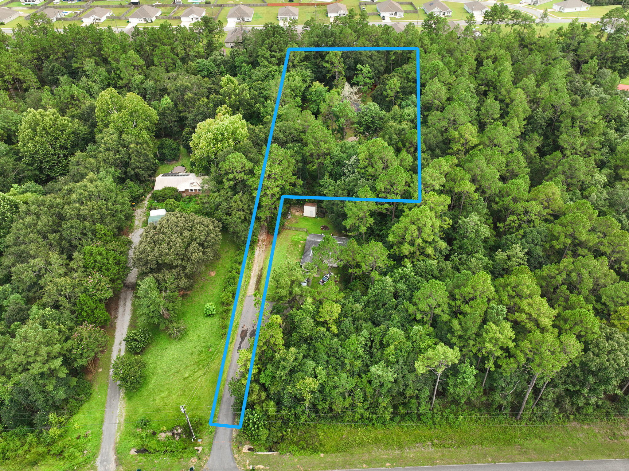 6359 Childrens Lane Crestview, FL 32539 - Photo 2 of 50 a view of a garden