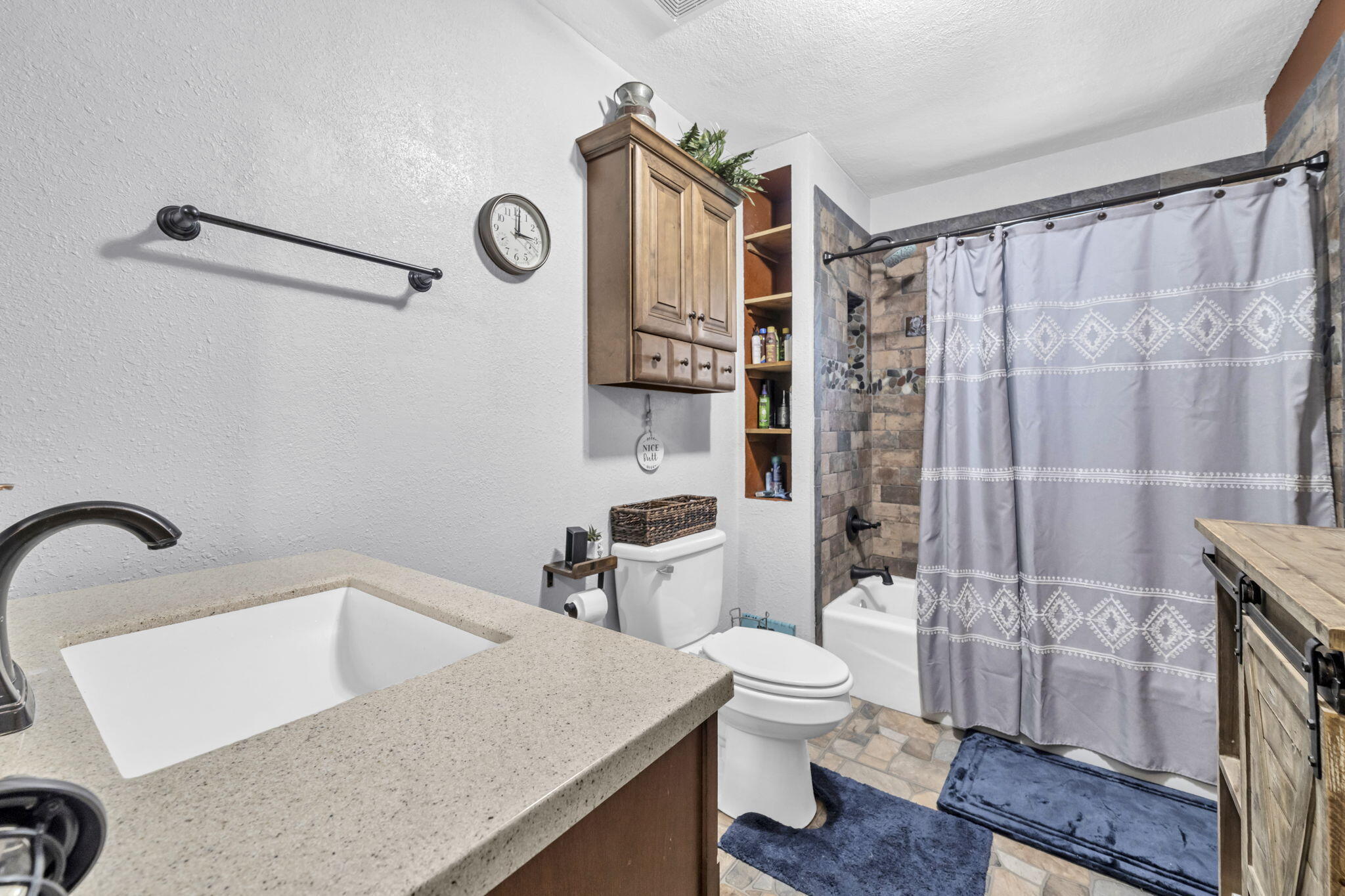 6359 Childrens Lane Crestview, FL 32539 - Photo 21 of 50 a bathroom with a sink a toilet and shower