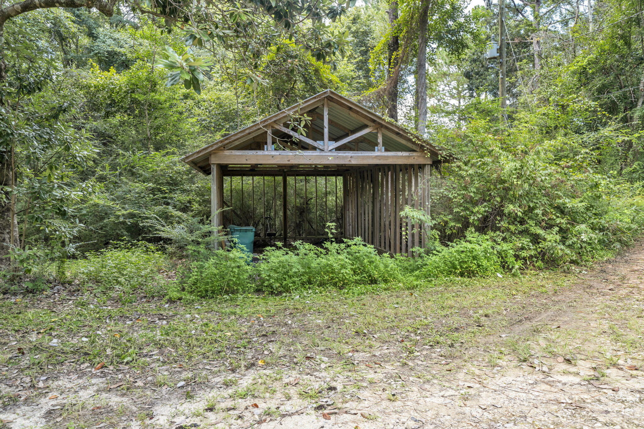 6359 Childrens Lane Crestview, FL 32539 - Photo 38 of 50 a front view of a house with garden