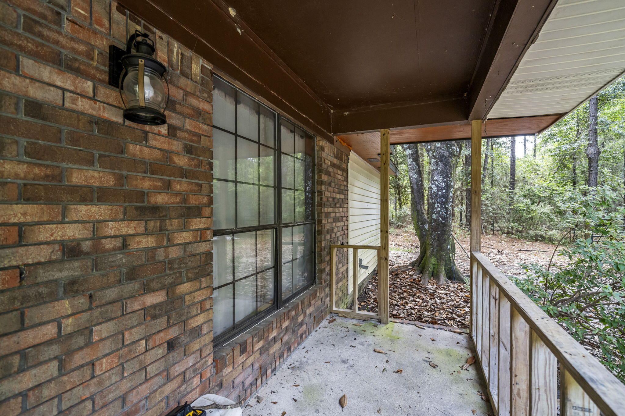 6359 Childrens Lane Crestview, FL 32539 - Photo 9 of 50 a view of balcony with wooden floor