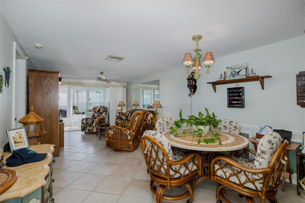 4206 Richmere Drive, Unit 3 New Port Richey, FL 34652 - Photo 19 of 41 a view of a dining room with furniture