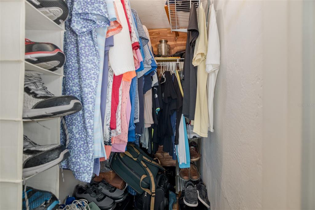 4206 Richmere Drive, Unit 3 New Port Richey, FL 34652 - Photo 26 of 41 a view of walk in closet with clothes