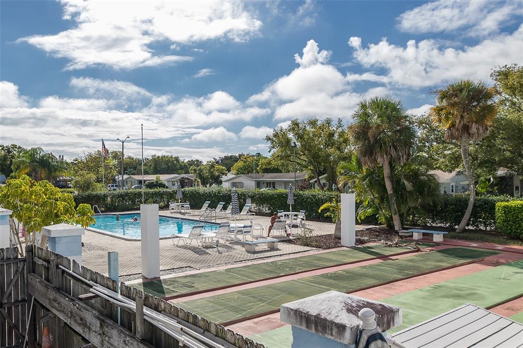 4206 Richmere Drive, Unit 3 New Port Richey, FL 34652 - Photo 38 of 41 a view of a patio with swimming pool