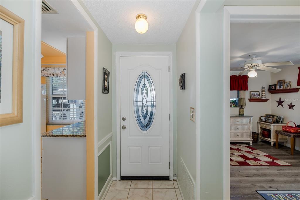 4206 Richmere Drive, Unit 3 New Port Richey, FL 34652 - Photo 7 of 41 a view of walk in closet with clothes and shoes