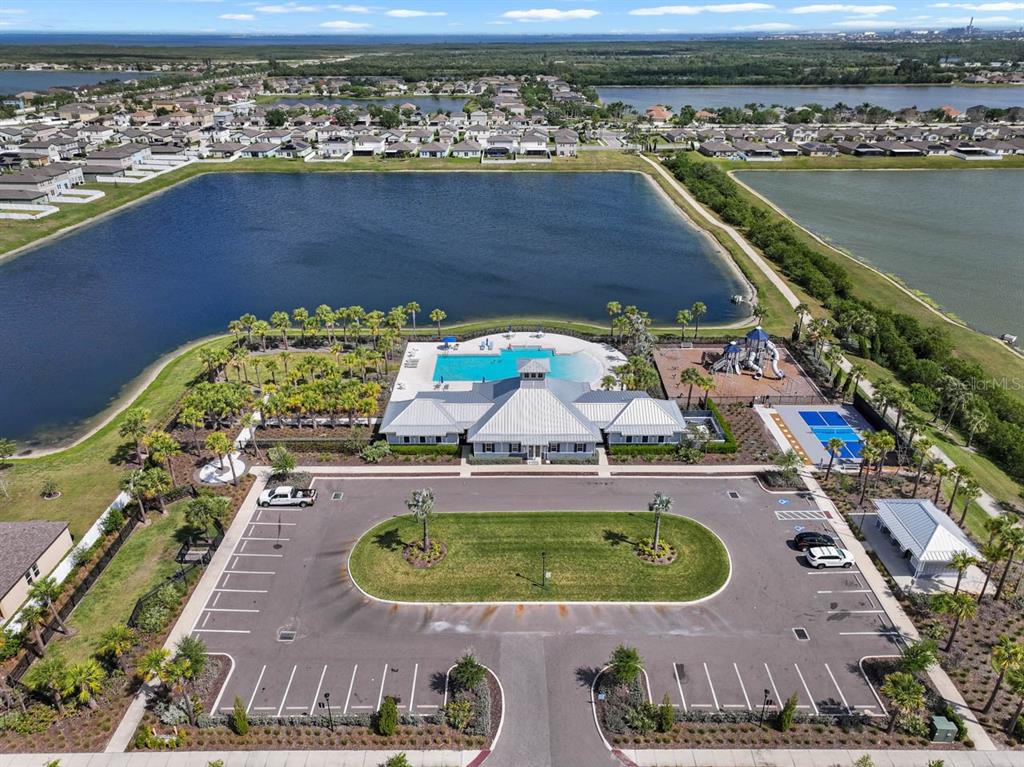 889 Calico Scallop Street Ruskin, FL 33570 - Photo 23 of 32 an aerial view of a house with a swimming pool