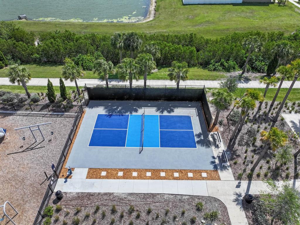 889 Calico Scallop Street Ruskin, FL 33570 - Photo 26 of 32 a view of swimming pool with seating space