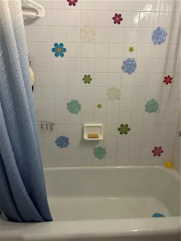 a bathroom with a bathtub